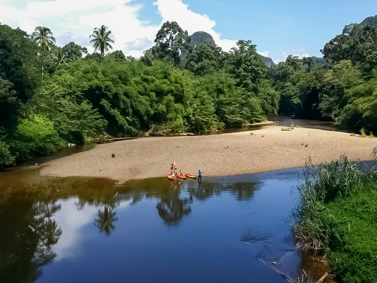 Kayak bike to remote beach Malaysia