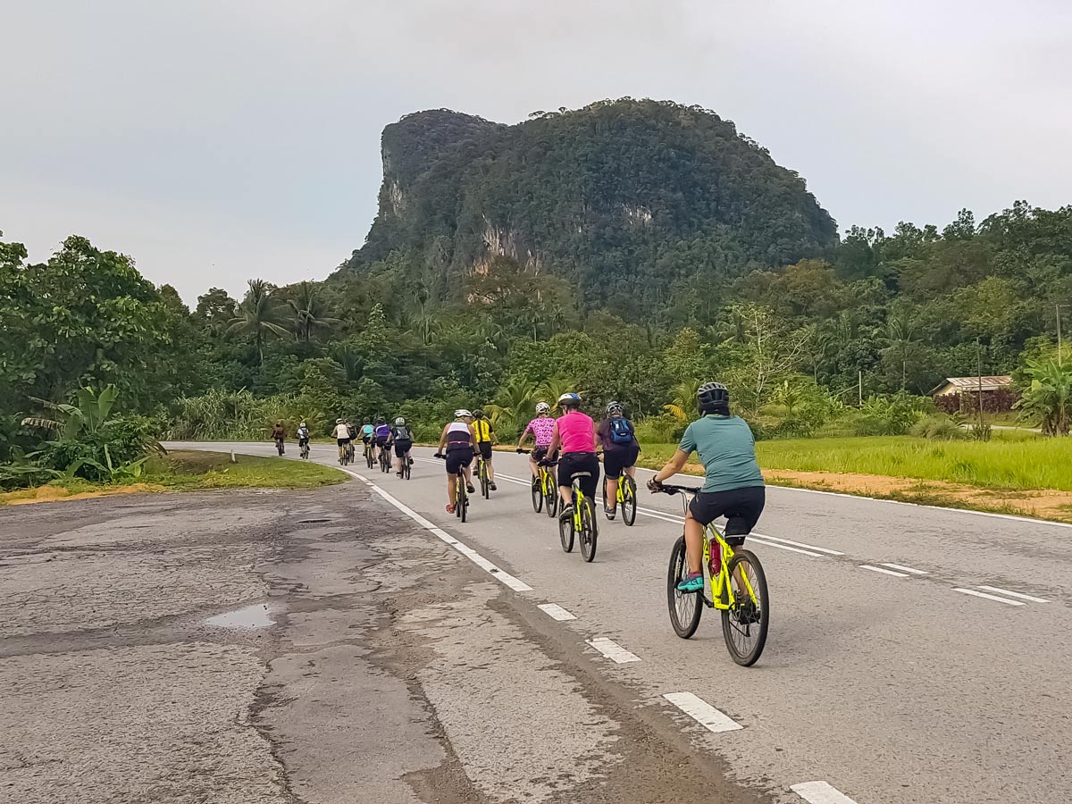 Bikers cycling to rainforest tour in Malaysia