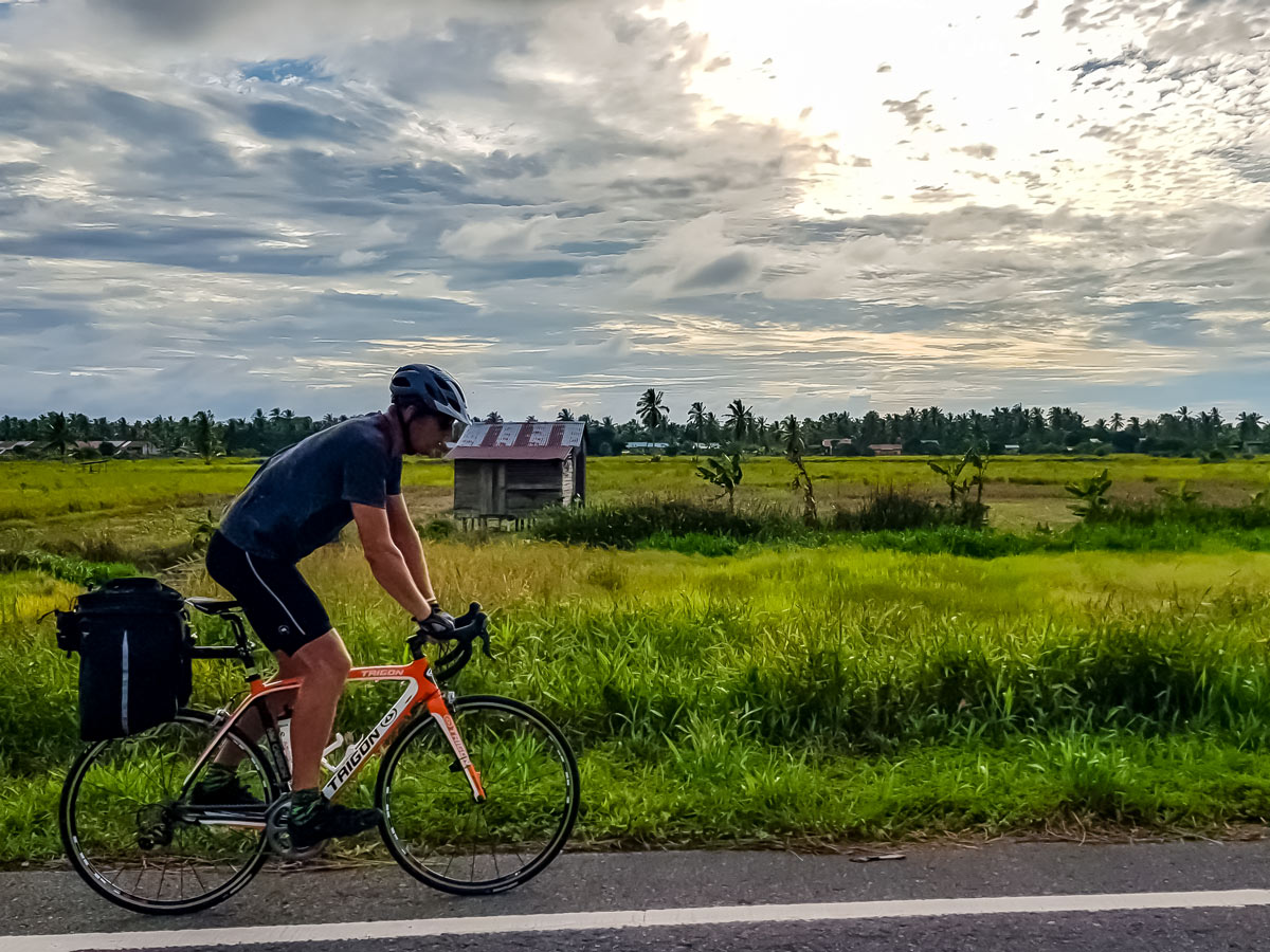 Road biking in Malaysia along Trans Borneo bike tour