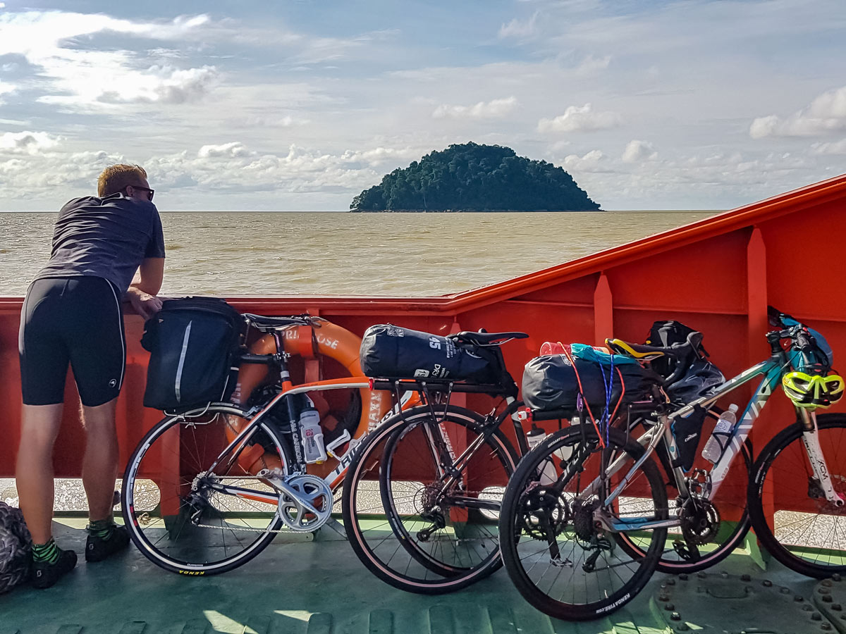 Ferry crossing along Trans Borneo road bike tour Malaysia