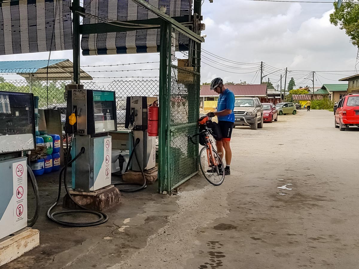 Rural gas station seen biking along Trans Borneo bike tour Malaysia