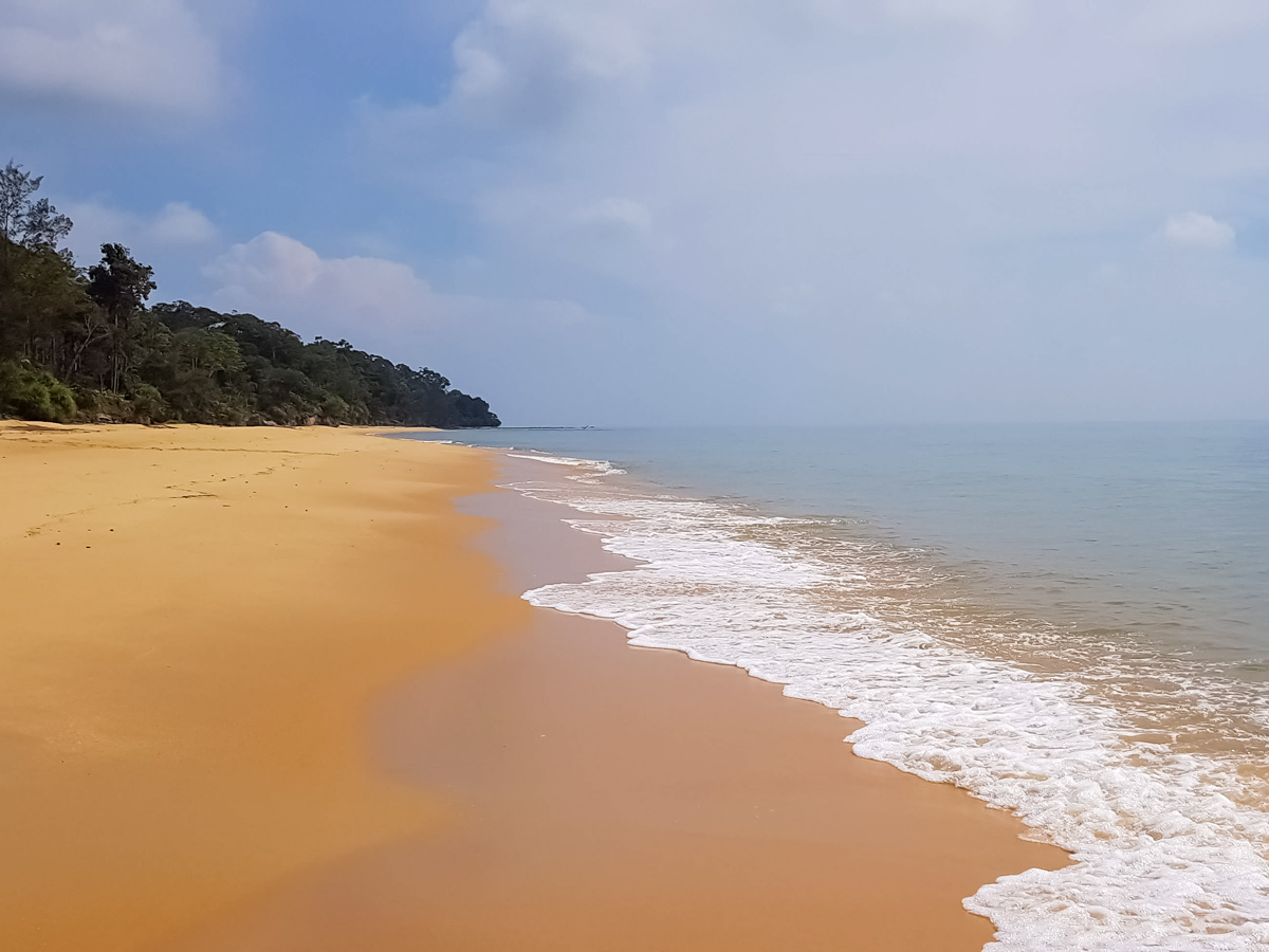 Beautiful beach along Trans Borneo road bike tour Malaysia