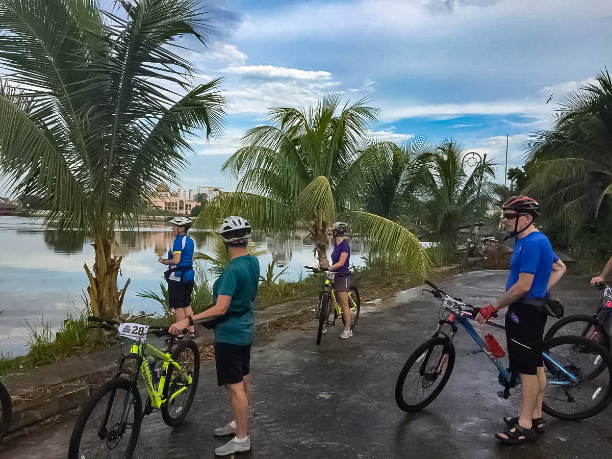 Cycling road biking along Borneo Wildlife Bike Safari tour Malaysia