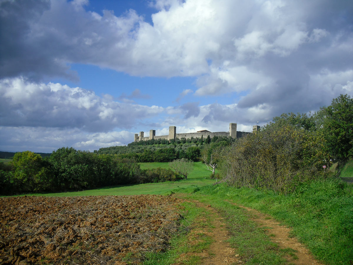 Approaching the Fortress on Via Francigena path from Parma to Siena
