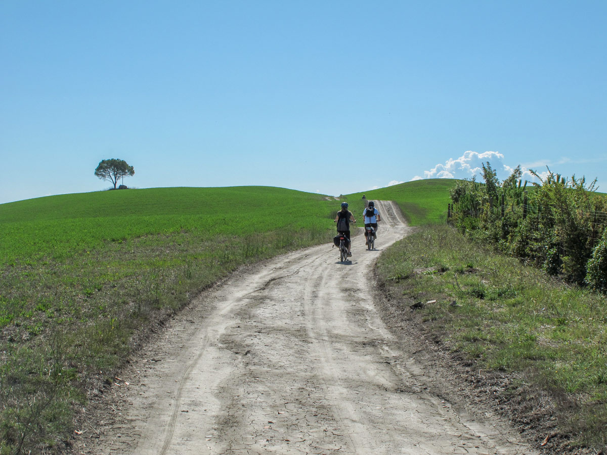 Biking the road to Bagno Vignoni on Via Francigena Route between Siena and Rome