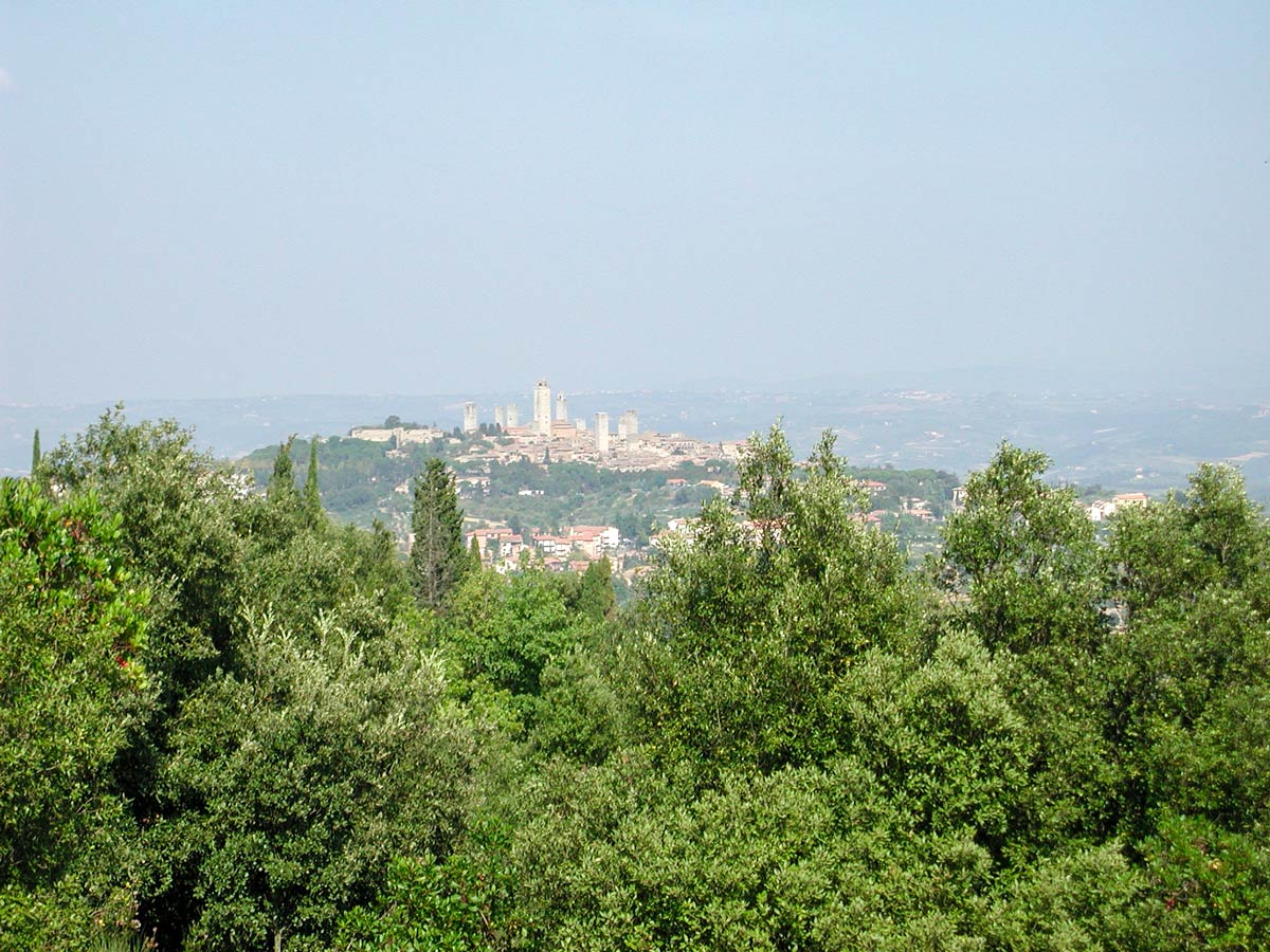 Looking at San Gimignano from afar biking tour in Italy
