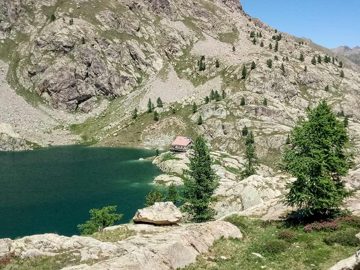 Mountain cabin on the lake seen hiking along Neolithic tour France