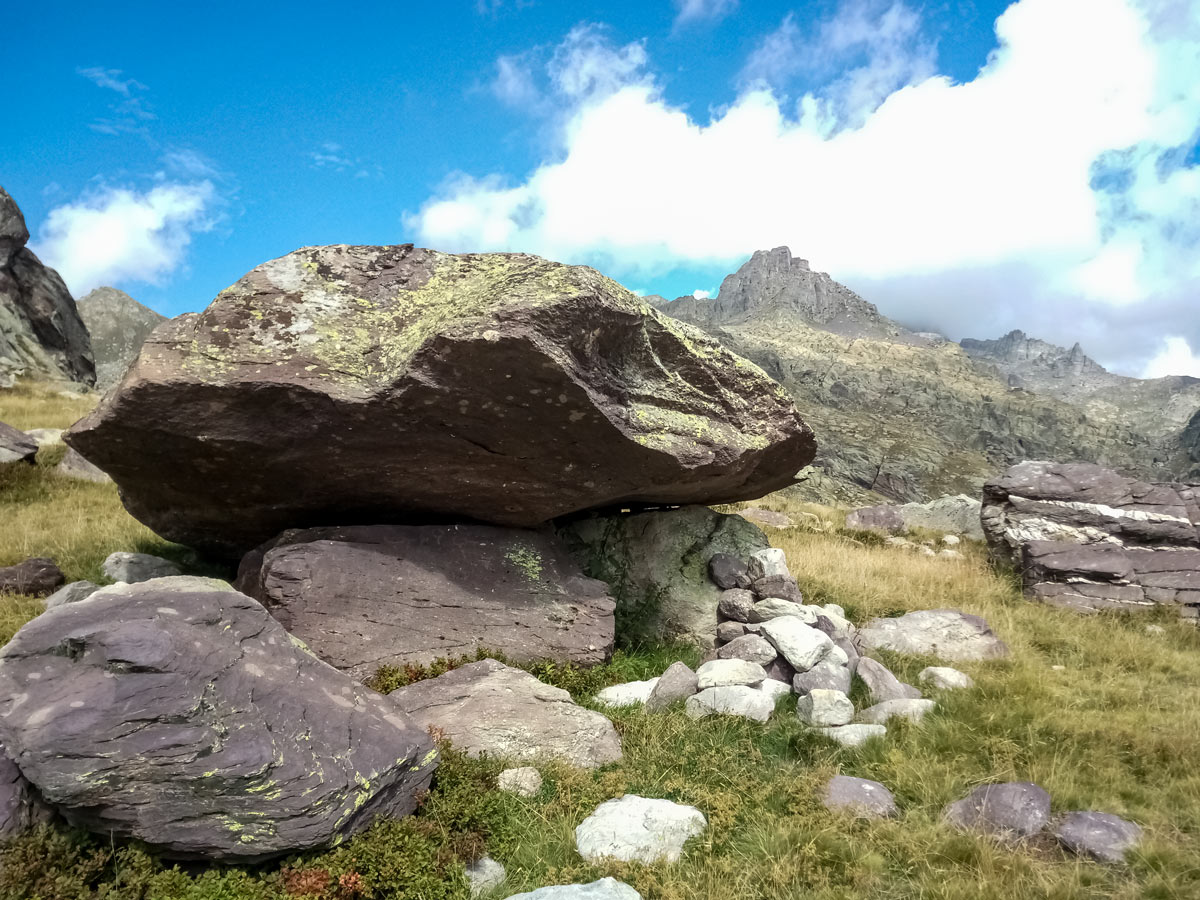 Rocky summit and boulders seen hiking along Neolithic tour France