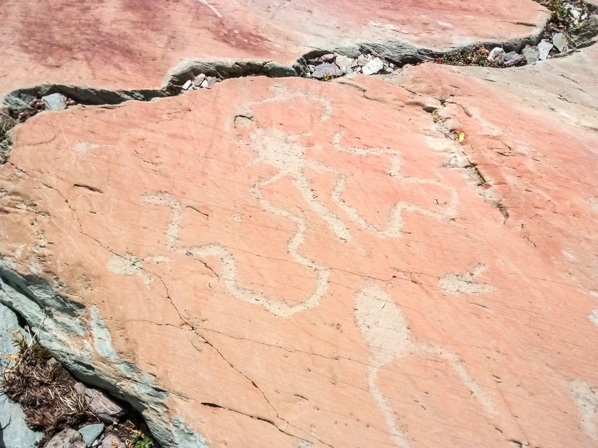 Rock carvings hieroglyphics seen along Neolithic tour France