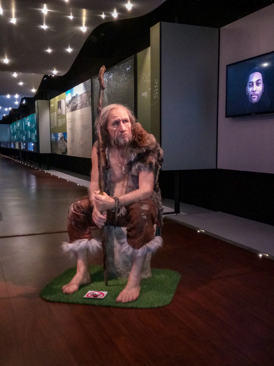 Neanderthal museum statue seen hiking along Neolithic tour France