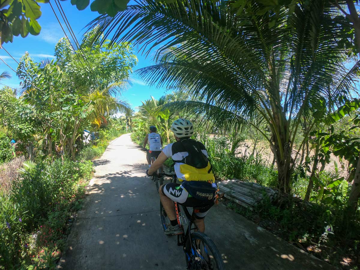 Cycling Cai Be while on guided biking tour