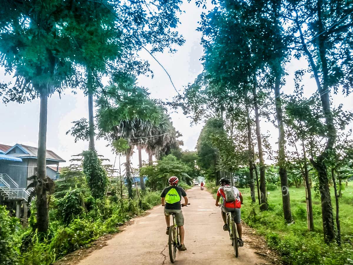 Cycling along the beautiful country roads between Mekong Delta and Angkor Wat