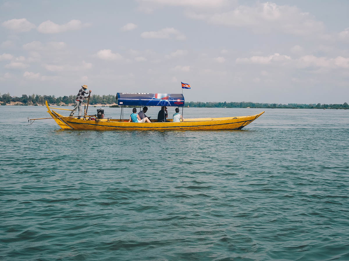 In search for Irrawaddy dolphins while on guided tour