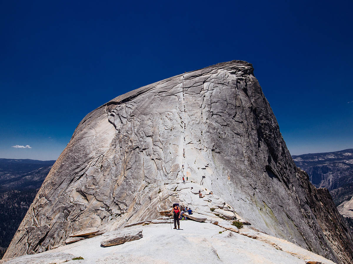 Hikers climbing up the Half Dome