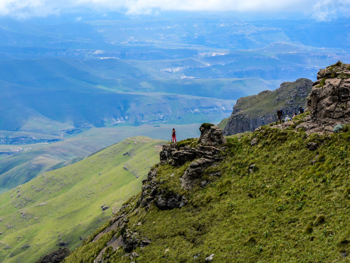 Woman standing in Drakensberg Mountains in South Africa