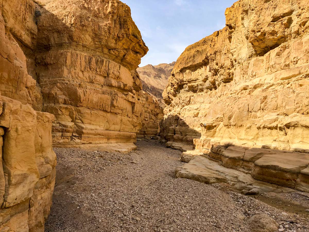 Hiking through beautiful rock canyons trekking in Israel