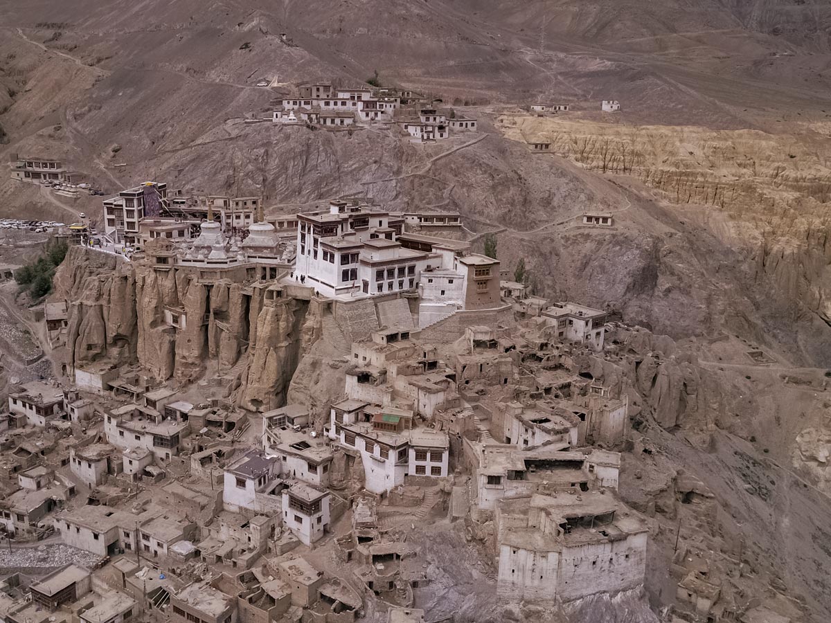 Ladakh Village on rock bluffs hoodoos seen hiking in India