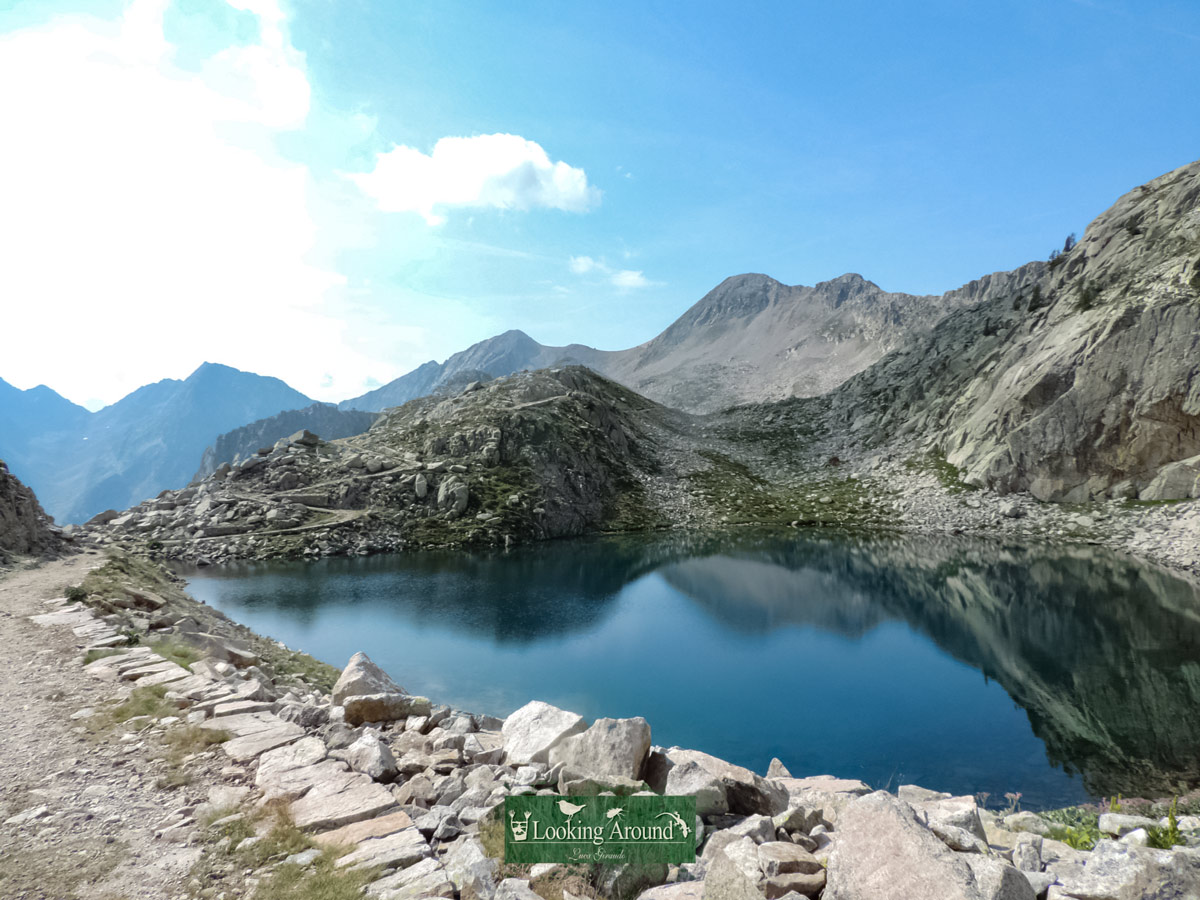 Reflections in mountain lake hiking Kings Path trek France