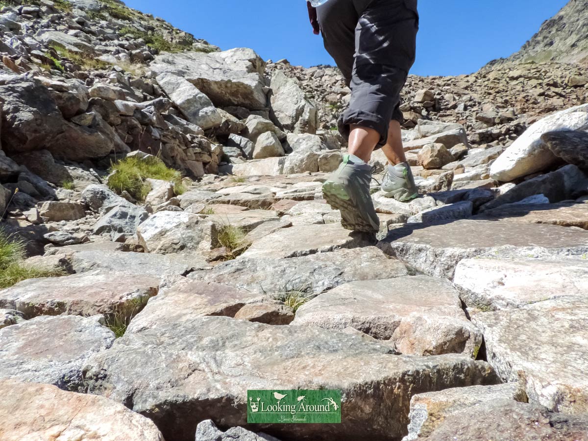 Running shoes hiking boots trekking rock path along Kings Path France