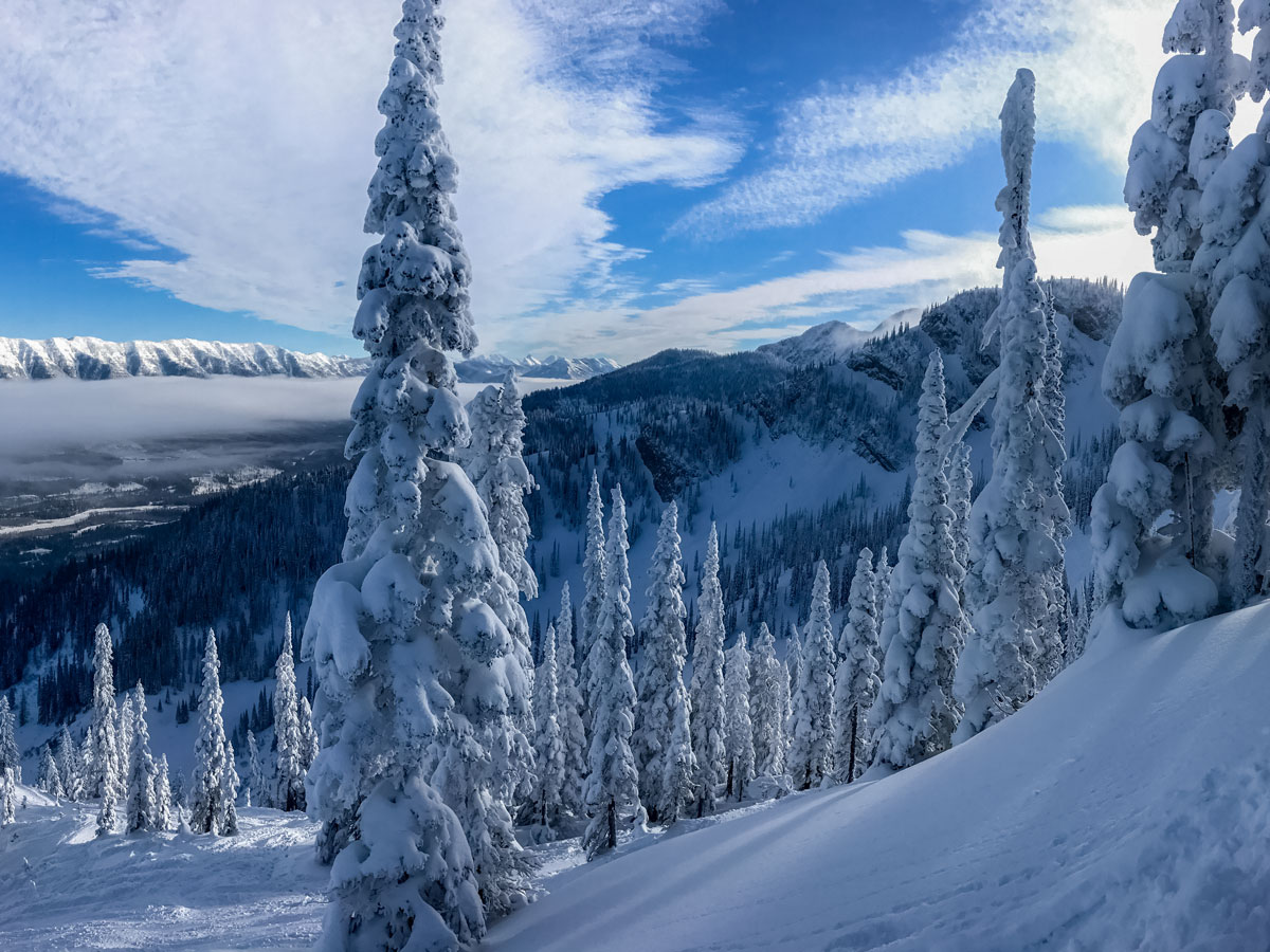 Beautiful snowy mountians valleys skiing snowboarding Powder highway BC Alberta Canada