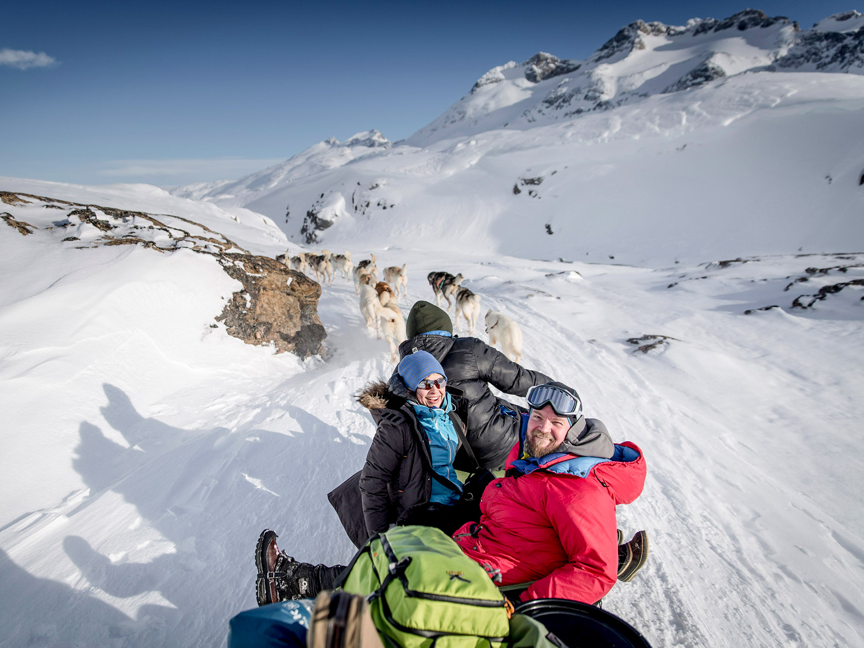 Dog Sledding adventure through mountains valleys in Greenland