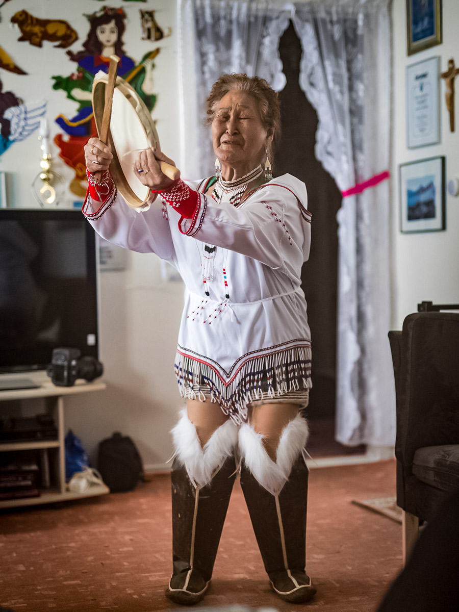 Indigenous dance ceremony along Dog Sledding adventure tour Greenland