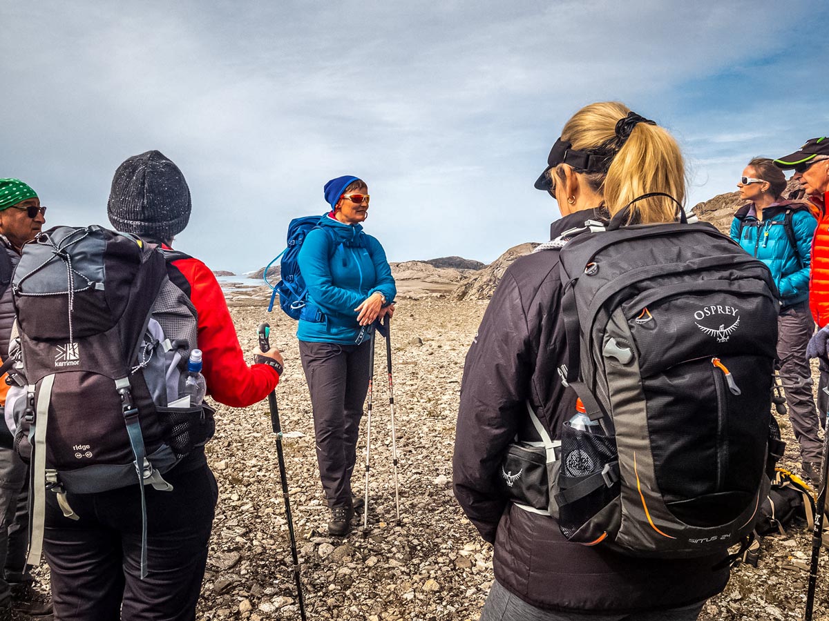Guide meets with trekking tour group Greenland