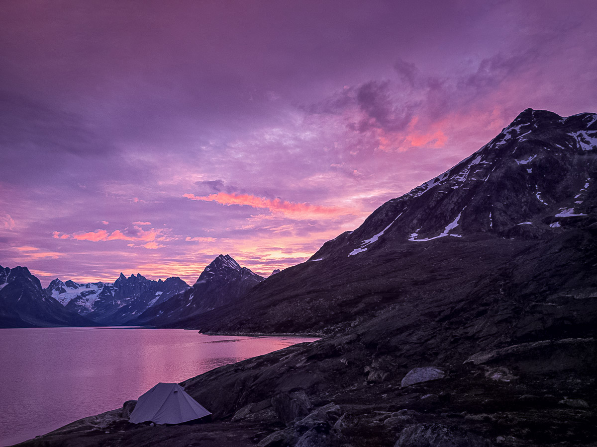 Midnight twilight at Tasiilaq Fjord campsite Greenland