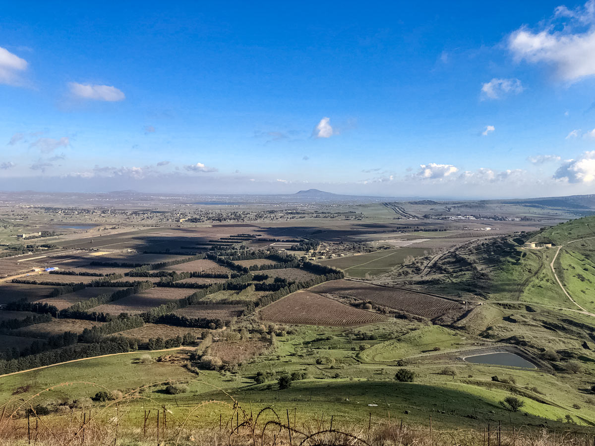 Farmland blue sky along Golan 7-day hike Israel