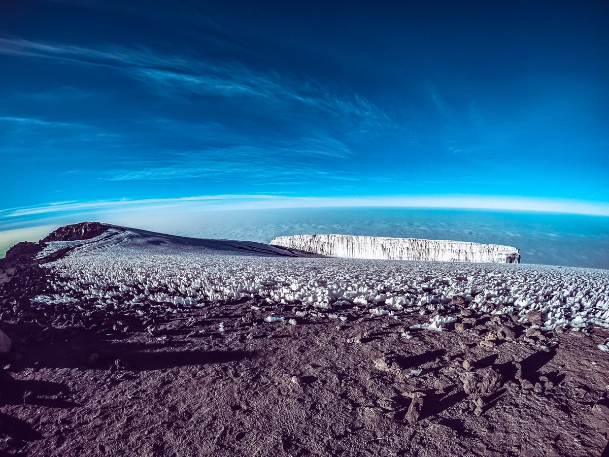 Ice on summit horizon view from Uhuru Peak hiking Kilimanjaro Tanzania