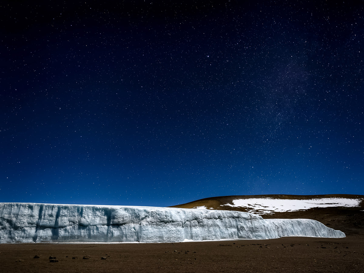 Mount Kilimanjaro summit crater and glacier under the stars Tanzania