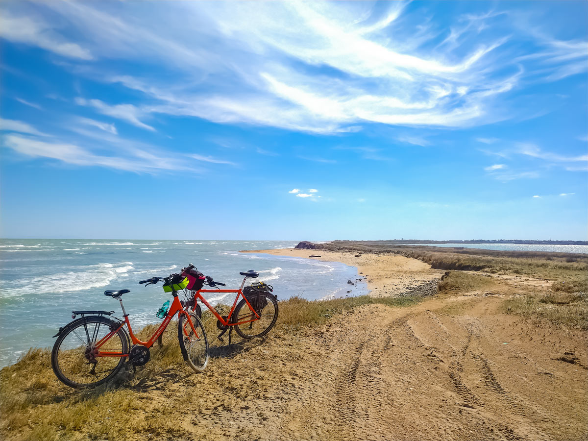 Bikes and beach puglia ocean shoreline cycling adventure tour Italy