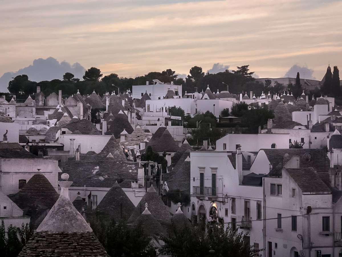 Alberobello trulli view of Puglia village rooftops along walking tour in Italy