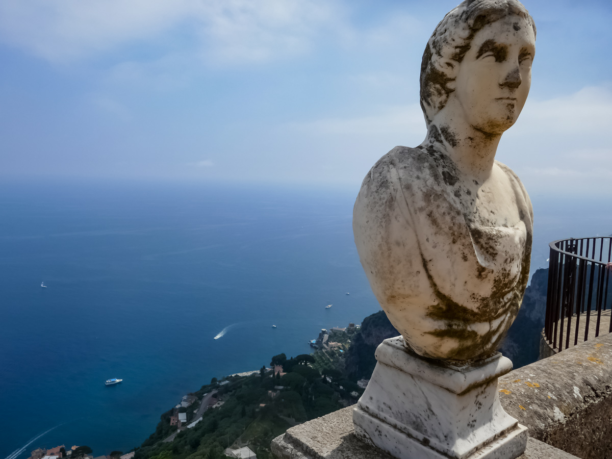 Ravello statue bust at viewpoint high above ocean sea waters Amalfi Coast Italy