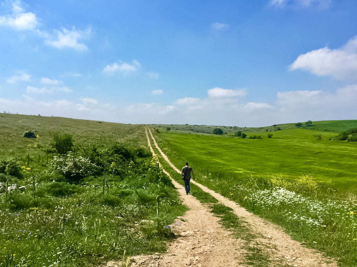 Hiking old dirt roads beautiful pastures Italy