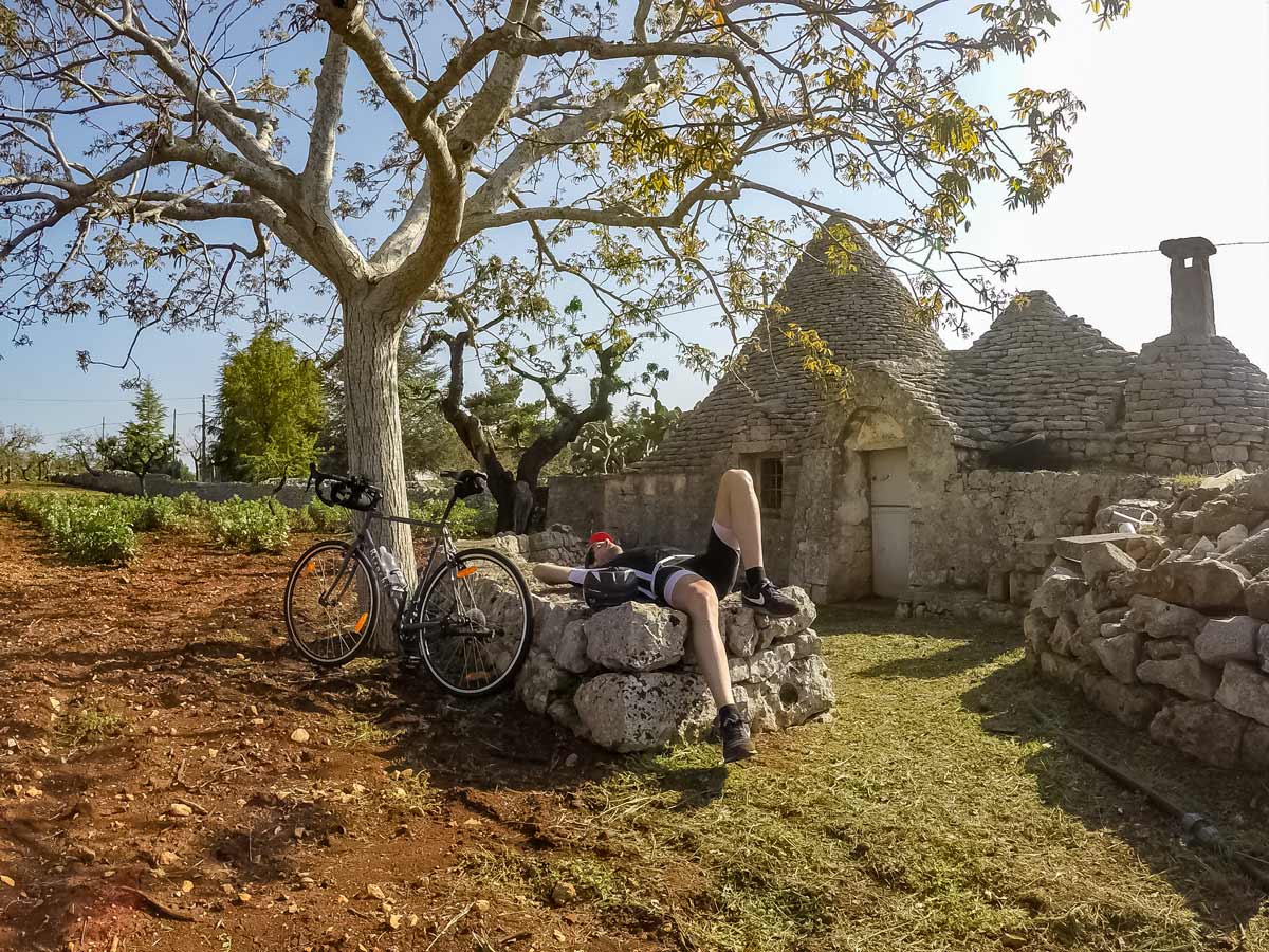 Rest among trulli cycling tour Italy