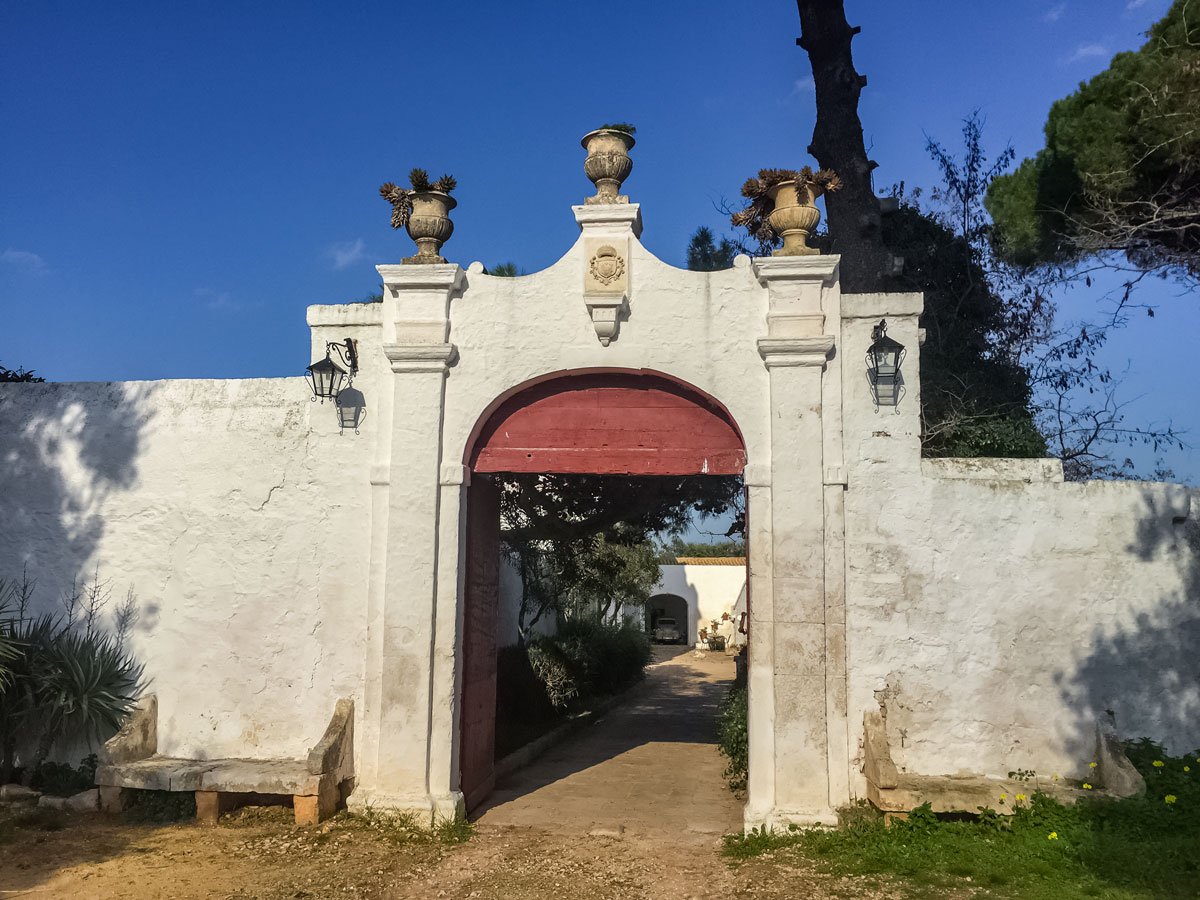 Masseria archway gate along walking tour in Puglia Italy