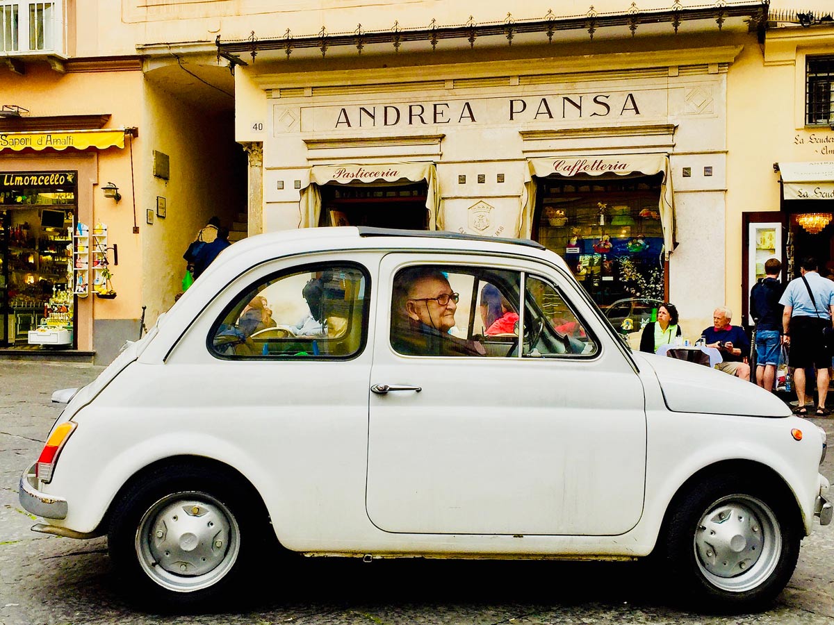 Vintage Italian car walking Amalfi Coast Italy