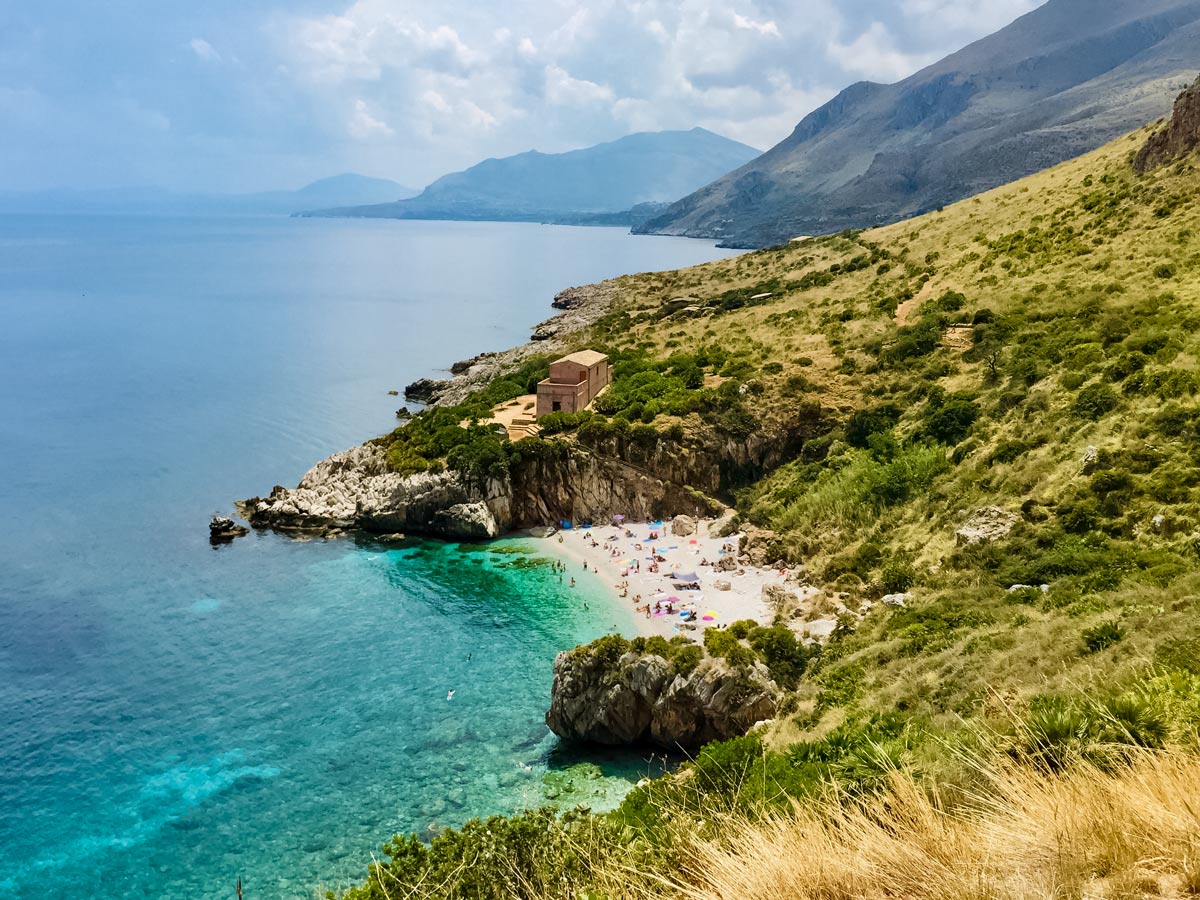 Zingaro beach clear sea water Western Sicily Walking Holiday Italy
