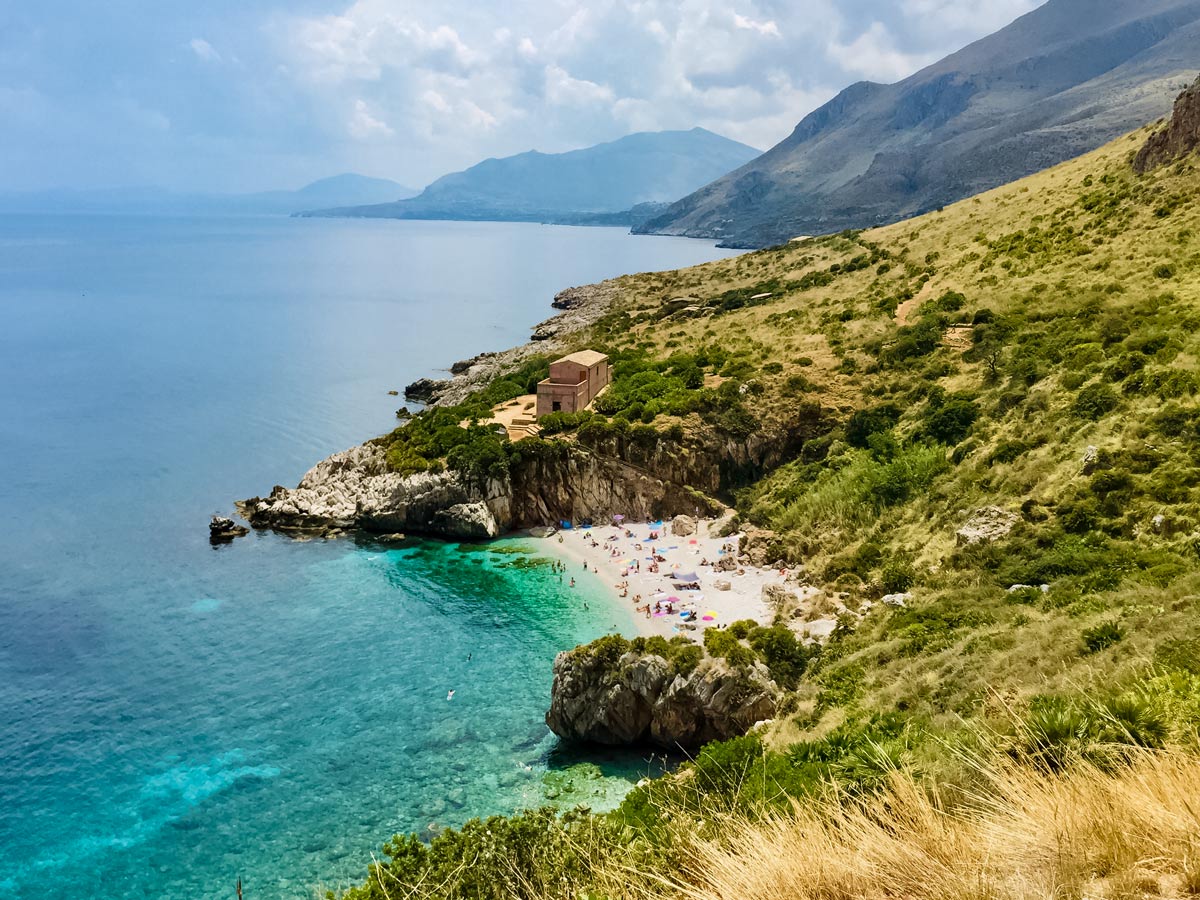 Zingaro beach clear sea water Western Sicily Walking Holiday Italy