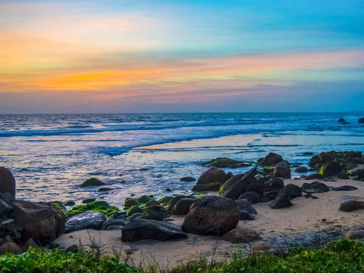 Kerala India beautiful ocean shore and beach at sunset