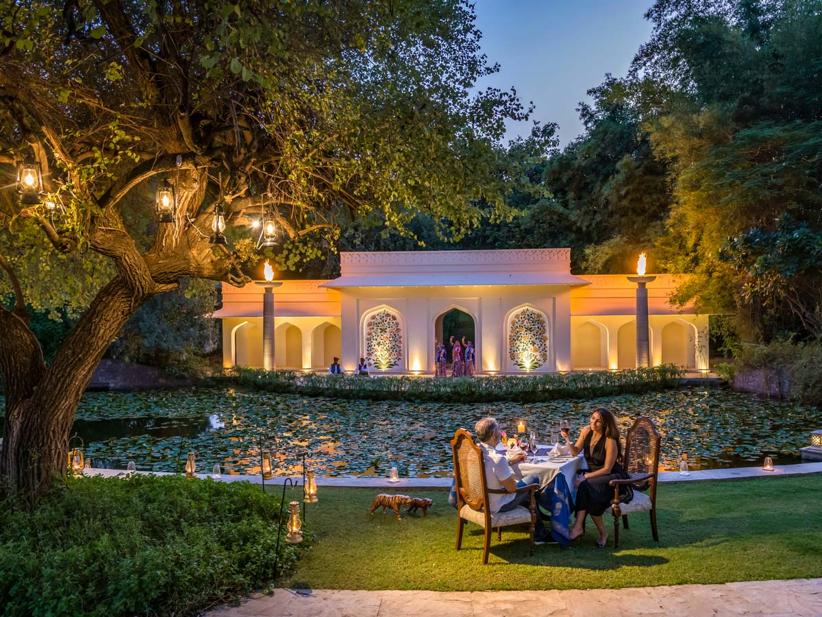 The Oberoi dining in the garden Vanyavilas Ranthambore India