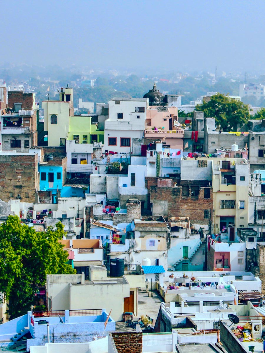 Udaipur colourful houses on the hillside India