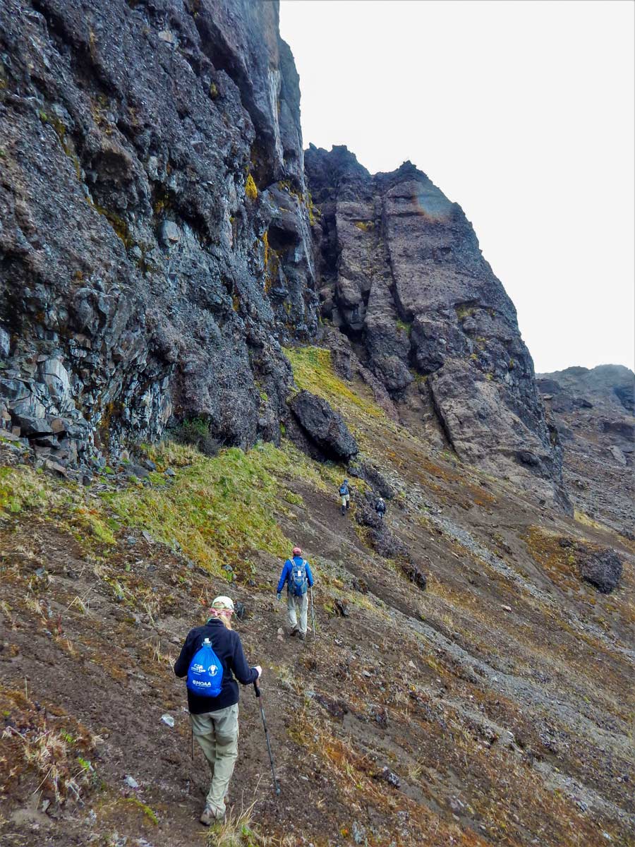 Hikers walking hiking trekking altar volcano Peru