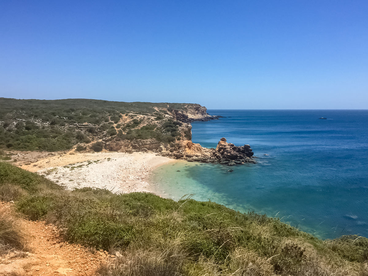 Portugal coastline aqua ocean water isolated beach bike tour