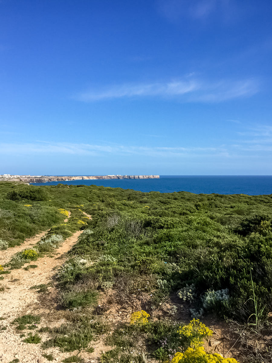 Portugal cycling tour rock bluffs cliffs in the distance