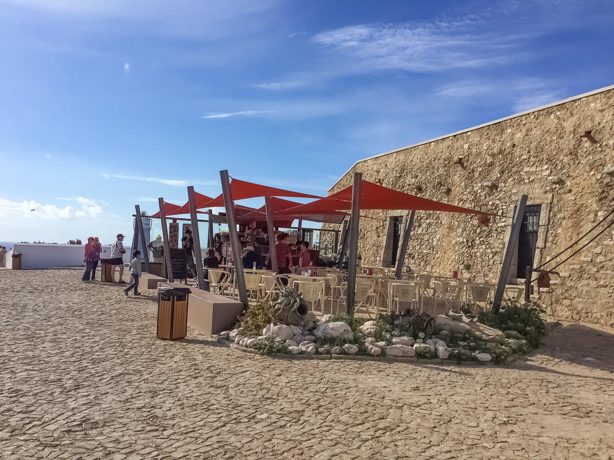 Portugal cycling tour coastal cafe market by the ocean