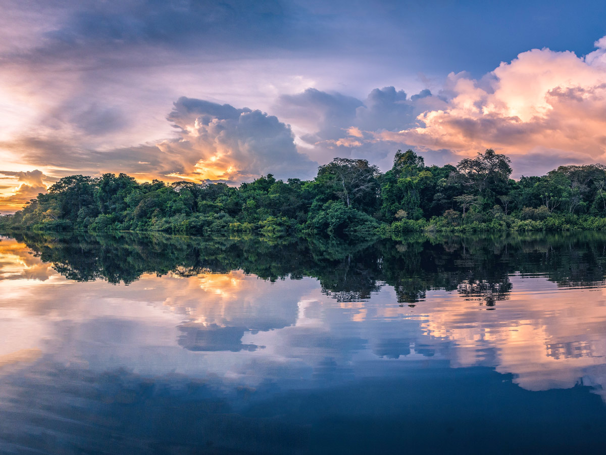 Amazon colourful sunset camping expedition Peru