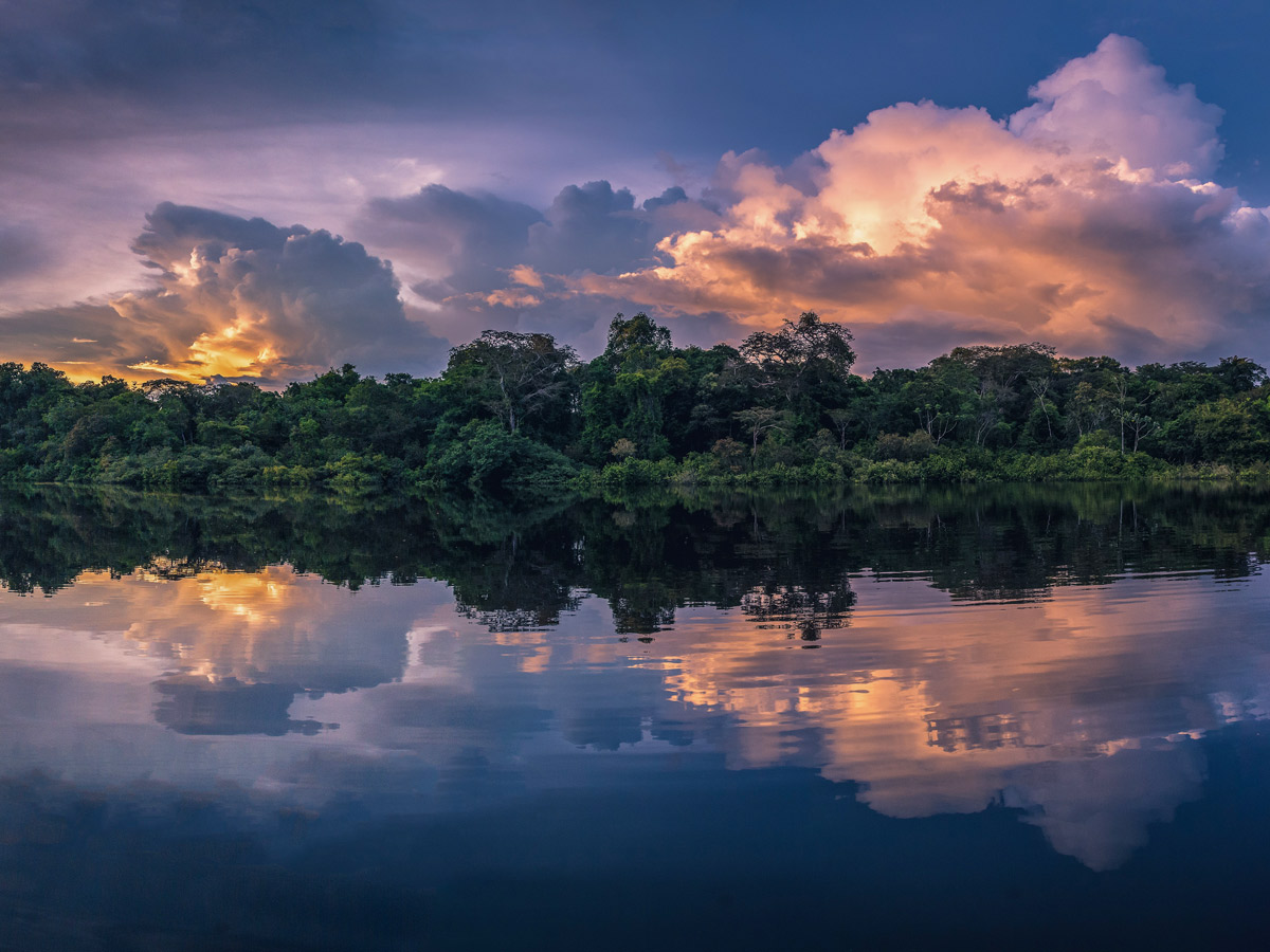 Amazon general tour beautiful sunset river rainforest Peru