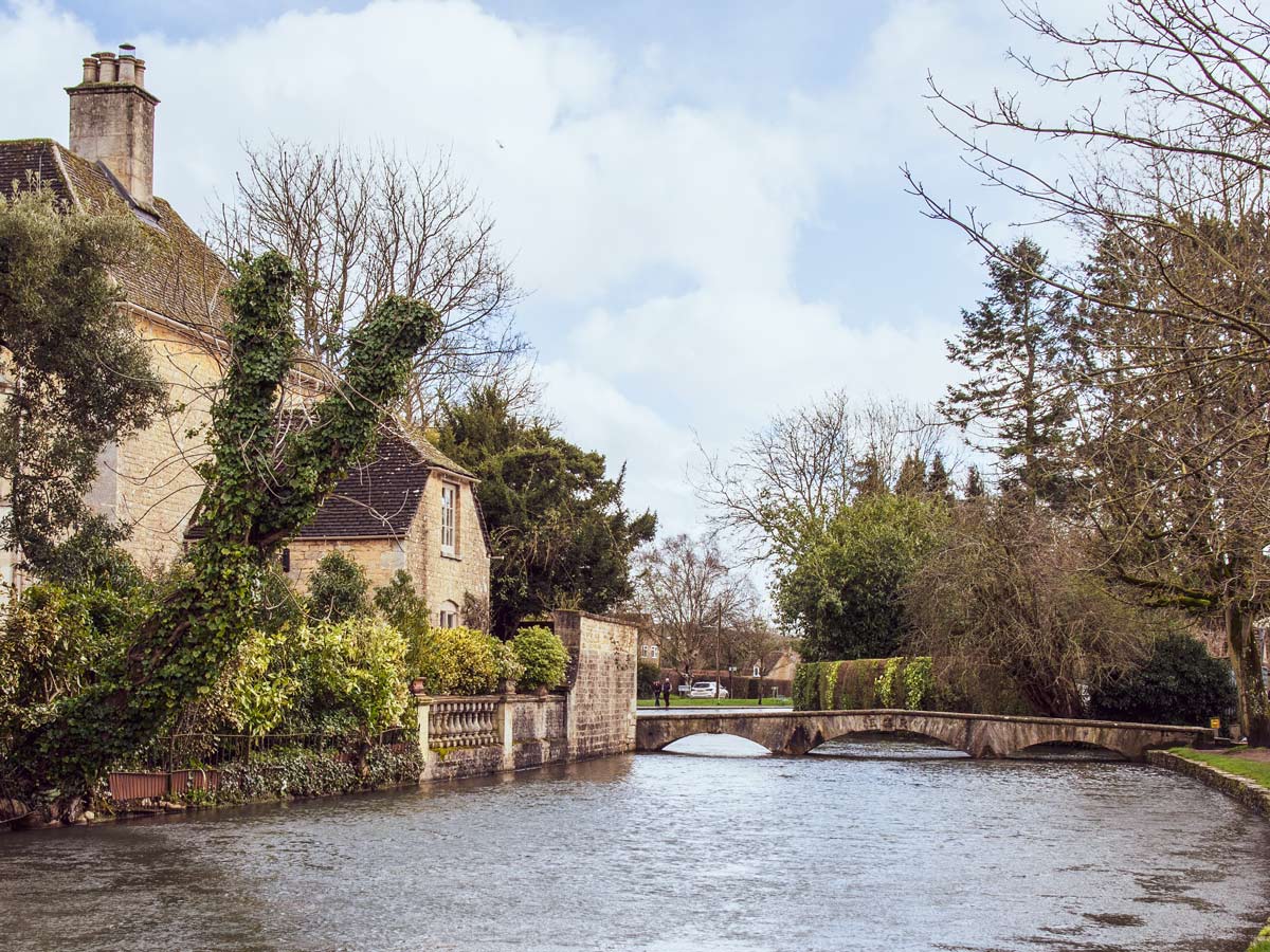 Bourton on the water river bridge Cotswold England